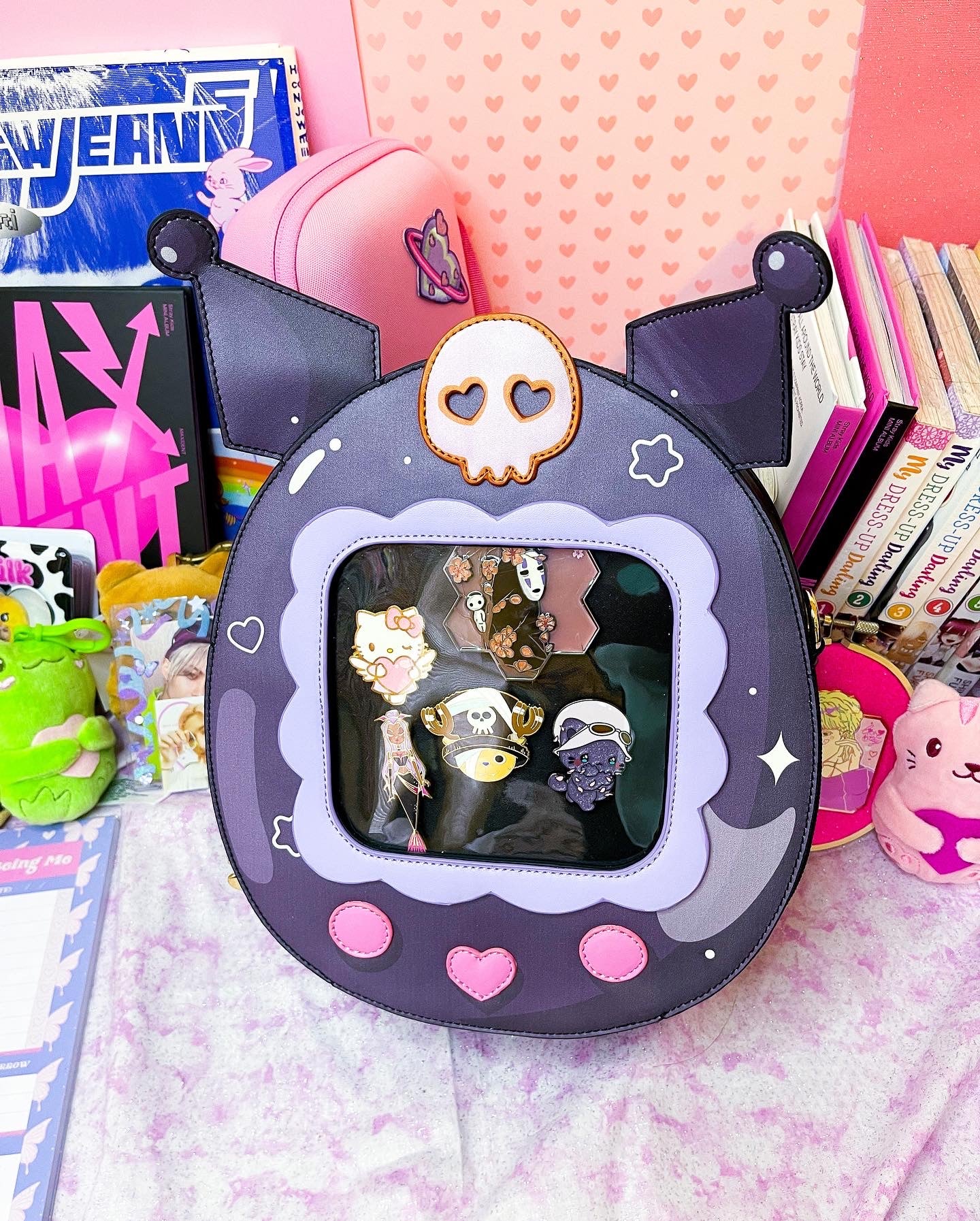 Cute Kitty and Friends Ita Bag and Enamel Pins in hand