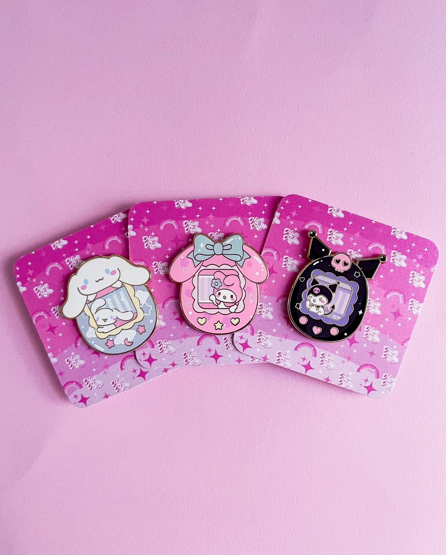 Cute Kitty and Friends Ita Bag and Enamel Pins in hand
