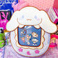 Cute Kitty and Friends Ita Bag and Enamel Pins in hand